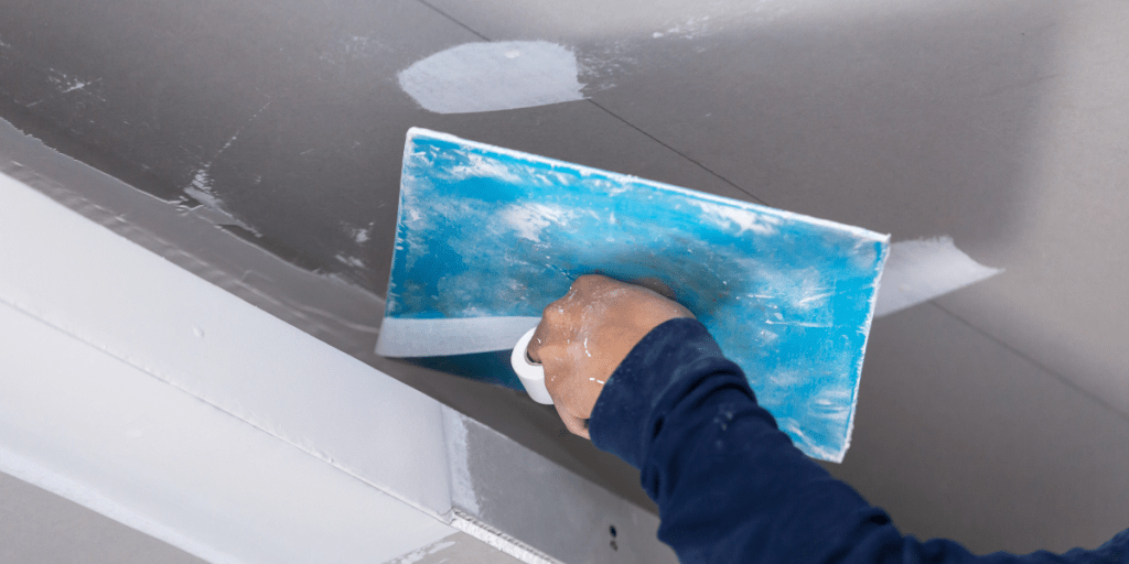 How to Fix Holes and Cracks in Plaster Walls
